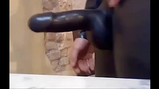 latexitaly wears latex and plays with his rubbered dick